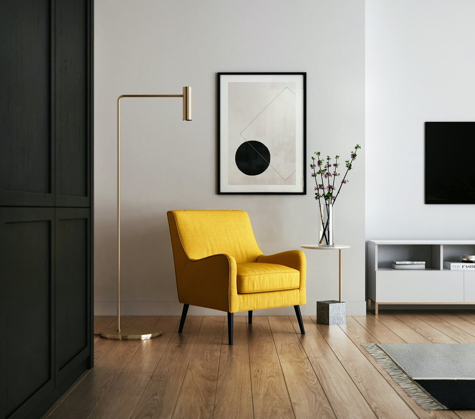 A calm, light-filled room with a single armchair and a brass floor lamp